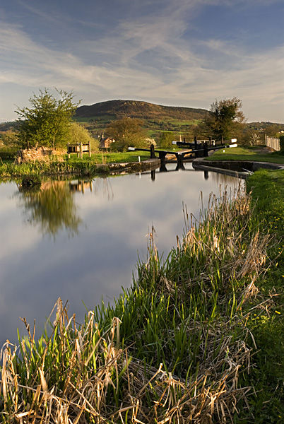 Setting sun on Cloudside viewed from Bosley locks Cheshire UK